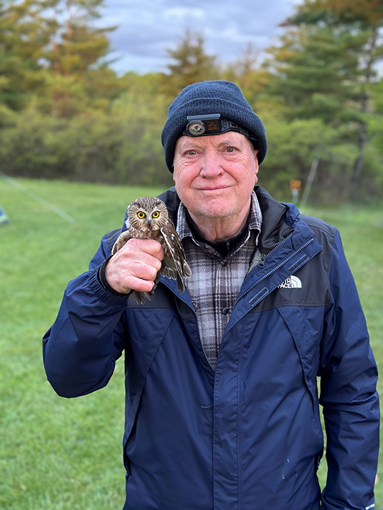GL 258 Northern Saw Whet Owl and Tom Barber at Crown Pont Banding Station 51024